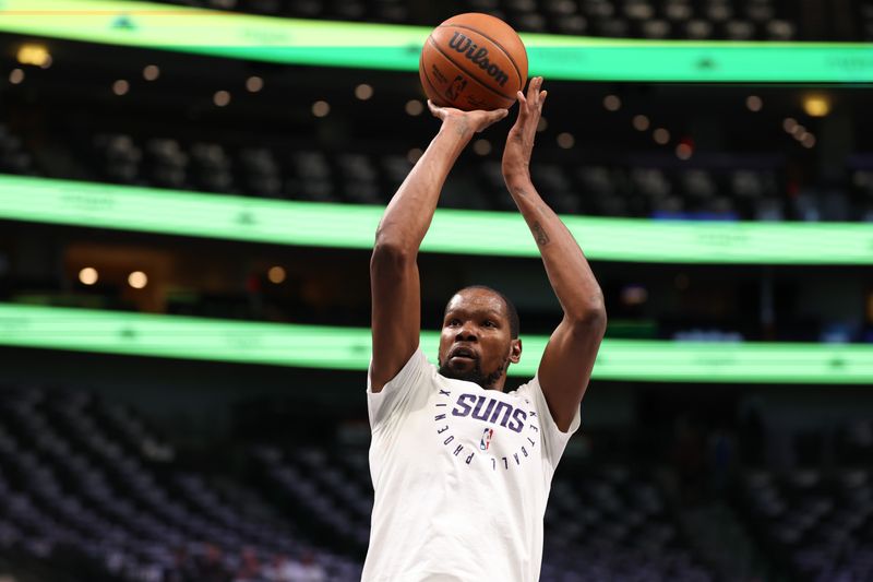 DALLAS, TEXAS - NOVEMBER 08: Kevin Durant #35 of the Phoenix Suns warms up before the game against the Dallas Mavericks at American Airlines Center on November 08, 2024 in Dallas, Texas. NOTE TO USER: User expressly acknowledges and agrees that, by downloading and or using this photograph, User is consenting to the terms and conditions of the Getty Images License Agreement. (Photo by Sam Hodde/Getty Images)