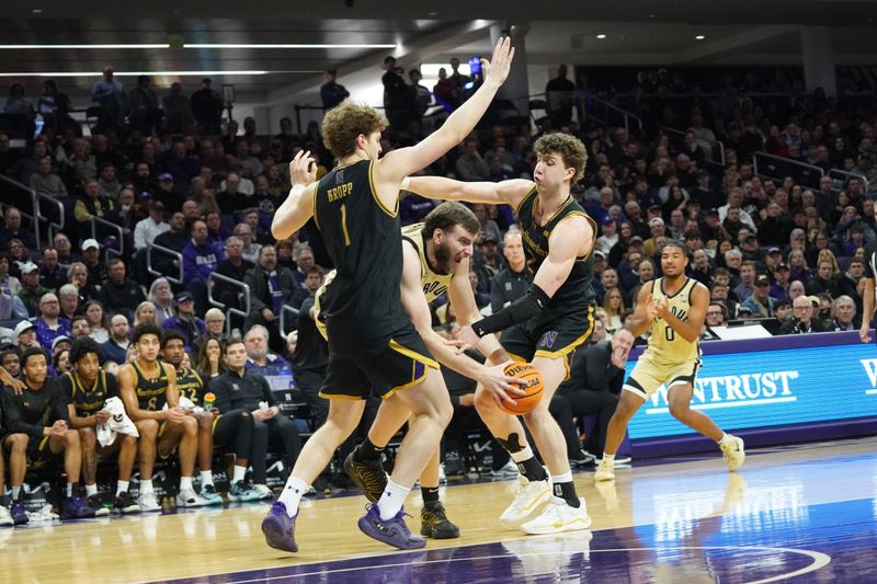 Mar 4, 2026; Evanston, Illinois, USA; Northwestern Wildcats forward Tyler Kropp (1) forward Nick Martinelli (2) defend Purdue Boilermakers center Oscar Cluff (45) during the first half at Welsh-Ryan Arena. Mandatory Credit: David Banks-Imagn Images
