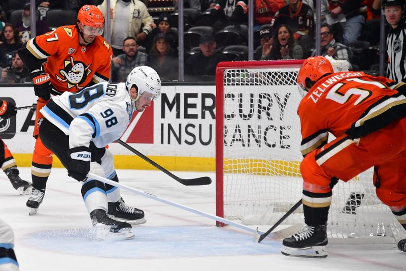 Nov 17, 2025; Anaheim, California, USA; Anaheim Ducks defenseman Olen Zellweger (51) scores a goal against the Utah Mammoth during the overtime period at Honda Center. Mandatory Credit: Gary A. Vasquez-Imagn Images