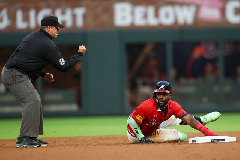 Sep 6, 2024; Atlanta, Georgia, USA; Atlanta Braves center fielder Michael Harris II (23) reacts after being called out on a steal attempt by umpire Doug Eddings (88) against the Toronto Blue Jays in the first inning at Truist Park. Mandatory Credit: Brett Davis-Imagn Images
