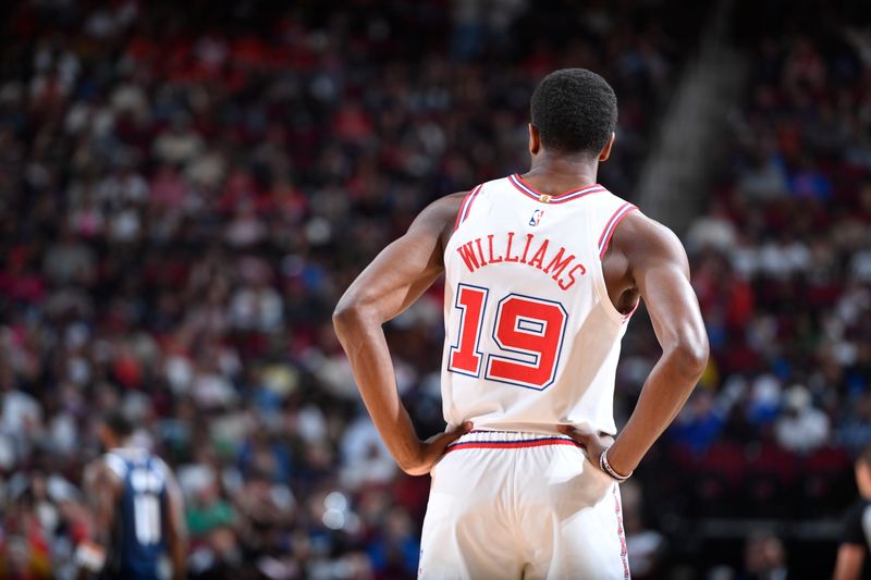 HOUSTON, TX - MARCH 31: Nate Williams #19 of the Houston Rockets looks on during the game against the Dallas Mavericks on March 31, 2024 at the Toyota Center in Houston, Texas. NOTE TO USER: User expressly acknowledges and agrees that, by downloading and or using this photograph, User is consenting to the terms and conditions of the Getty Images License Agreement. Mandatory Copyright Notice: Copyright 2024 NBAE (Photo by Logan Riely/NBAE via Getty Images)