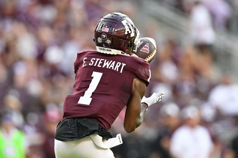 Sep 2, 2023; College Station, Texas, USA; Texas A&M Aggies wide receiver Evan Stewart (1) receives a touchdown pass from quarterback Conner Weigman (not pictured) during the second quarter against the New Mexico Lobos at Kyle Field. Mandatory Credit: Maria Lysaker-USA TODAY Sports