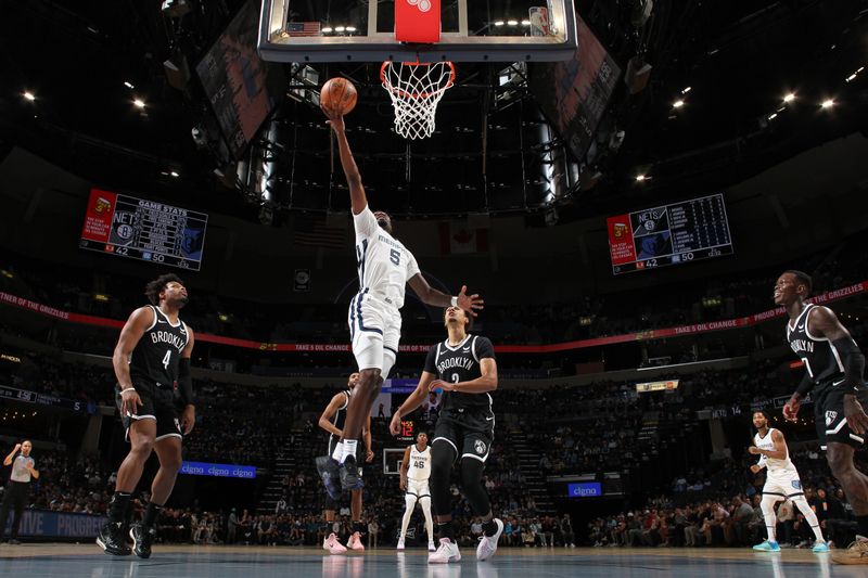 MEMPHIS, TN - February 26:  Vince Williams Jr. #5 of the Memphis Grizzlies drives to the basket during the game against the Brooklyn Nets on February 26, 2024 at FedExForum in Memphis, Tennessee. NOTE TO USER: User expressly acknowledges and agrees that, by downloading and or using this photograph, User is consenting to the terms and conditions of the Getty Images License Agreement. Mandatory Copyright Notice: Copyright 2024 NBAE (Photo by Joe Murphy/NBAE via Getty Images)