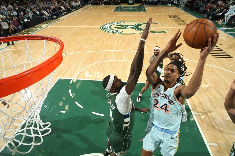 MILWAUKEE, WI - JANUARY 8: Devin Vassell #24 of the San Antonio Spurs drives to the basket during the game against the Milwaukee Bucks on January 8, 2025 at the Fiserv Forum Center in Milwaukee, Wisconsin. NOTE TO USER: User expressly acknowledges and agrees that, by downloading and or using this Photograph, user is consenting to the terms and conditions of the Getty Images License Agreement. Mandatory Copyright Notice: Copyright 2025 NBAE (Photo by Gary Dineen/NBAE via Getty Images).