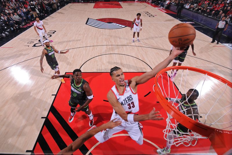 PORTLAND, OR - NOVEMBER 13: Toumani Camara #33 of the Portland Trail Blazers drives to the basket during the game against the Minnesota Timberwolves on November 13, 2024 at the Moda Center Arena in Portland, Oregon. NOTE TO USER: User expressly acknowledges and agrees that, by downloading and or using this photograph, user is consenting to the terms and conditions of the Getty Images License Agreement. Mandatory Copyright Notice: Copyright 2024 NBAE (Photo by Cameron Browne/NBAE via Getty Images)