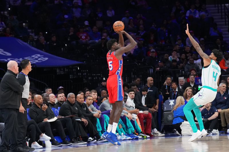 PHILADELPHIA, PA - MARCH 1: Mo Bamba #5 of the Philadelphia 76ers shoots a three point basket during the game against the Charlotte Hornets on March 1, 2024 at the Wells Fargo Center in Philadelphia, Pennsylvania NOTE TO USER: User expressly acknowledges and agrees that, by downloading and/or using this Photograph, user is consenting to the terms and conditions of the Getty Images License Agreement. Mandatory Copyright Notice: Copyright 2024 NBAE (Photo by Jesse D. Garrabrant/NBAE via Getty Images)