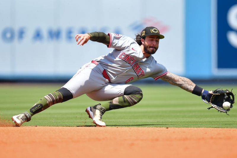 May 19, 2024; Los Angeles, California, USA; Cincinnati Reds second base Jonathan India (6) fields the ground ball of Los Angeles Dodgers right fielder Jason Heyward (23) during the second inning at Dodger Stadium. Mandatory Credit: Gary A. Vasquez-USA TODAY Sports