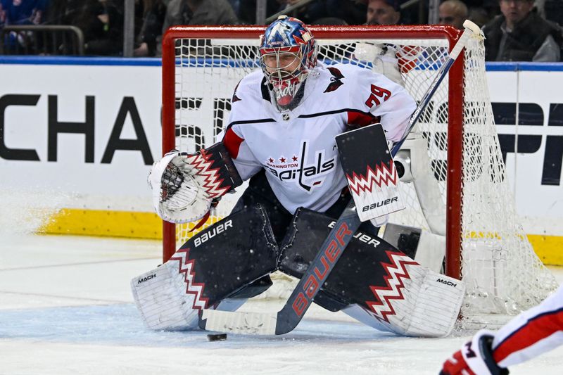 Apr 23, 2024; New York, New York, USA;  Washington Capitals goaltender Charlie Lindgren (79) makes a save against the New York Rangers during the third period in game two of the first round of the 2024 Stanley Cup Playoffs at Madison Square Garden. Mandatory Credit: Dennis Schneidler-USA TODAY Sports