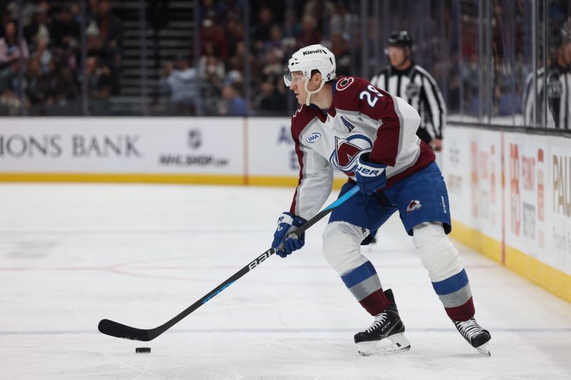 Oct 24, 2024; Salt Lake City, Utah, USA; Colorado Avalanche center Nathan MacKinnon (29) skates with the puck against against the Utah Hockey Club during the first period at Delta Center. Mandatory Credit: Rob Gray-Imagn Images