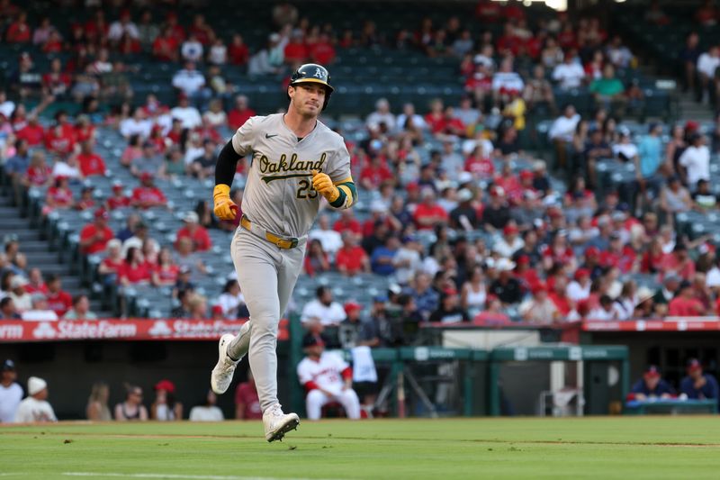 Jul 25, 2024; Anaheim, California, USA;  Oakland Athletics designated hitter Brent Rooker (25)  runs the bases after hitting a home run during the first inning against the Los Angeles Angels at Angel Stadium. Mandatory Credit: Kiyoshi Mio-USA TODAY Sports