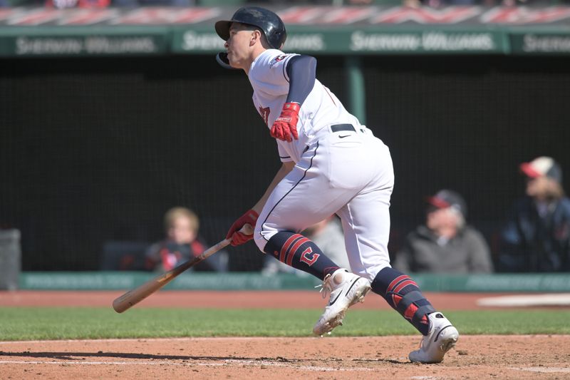 Apr 9, 2023; Cleveland, Ohio, USA; Cleveland Guardians right fielder Will Brennan (17) hits an RBI double during the ninth inning against the Seattle Mariners at Progressive Field. Mandatory Credit: Ken Blaze-USA TODAY Sports