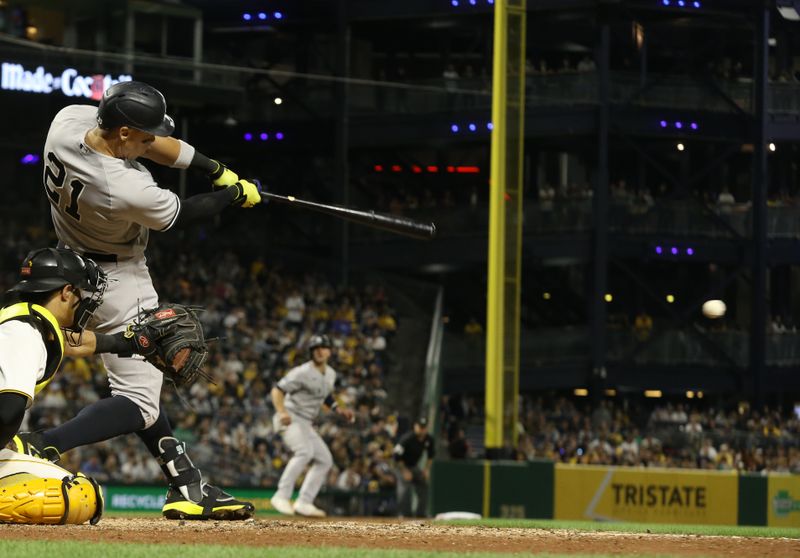 Sep 15, 2023; Pittsburgh, Pennsylvania, USA;  New York Yankees right fielder Aaron Judge (99) hits an RBI single  against the Pittsburgh Pirates during the sixth inning at PNC Park. Mandatory Credit: Charles LeClaire-USA TODAY Sports