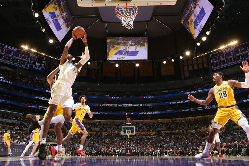 LOS ANGELES, CA - FEBRUARY 27: Jaden McDaniels #3 of the Minnesota Timberwolves drives to the basket during the game against the Los Angeles Lakers on February 27, 2025 at Crypto.Com Arena in Los Angeles, California. NOTE TO USER: User expressly acknowledges and agrees that, by downloading and/or using this Photograph, user is consenting to the terms and conditions of the Getty Images License Agreement. Mandatory Copyright Notice: Copyright 2025 NBAE (Photo by Nathaniel S. Butler/NBAE via Getty Images)