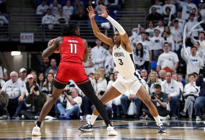 Feb 26, 2023; University Park, Pennsylvania, USA; Penn State Nittany Lions forward Kebba Njie (3) defends as Rutgers Scarlet Knights center Clifford Omoruyi (11) holds the ball during the first half at Bryce Jordan Center. Mandatory Credit: Matthew OHaren-USA TODAY Sports