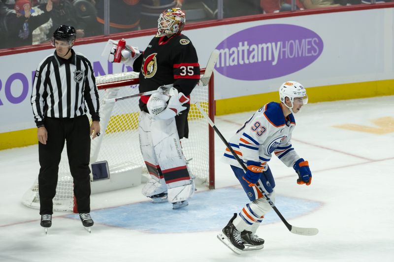 Nov 19, 2024; Ottawa, Ontario, CAN; Edmonton Oilers center Ryan Nugent-Hopkins (93) skates past Senators goalie Linus Ullmark (35) after scoring a goal in the third period at the Canadian Tire Centre. Mandatory Credit: Marc DesRosiers-Imagn Images