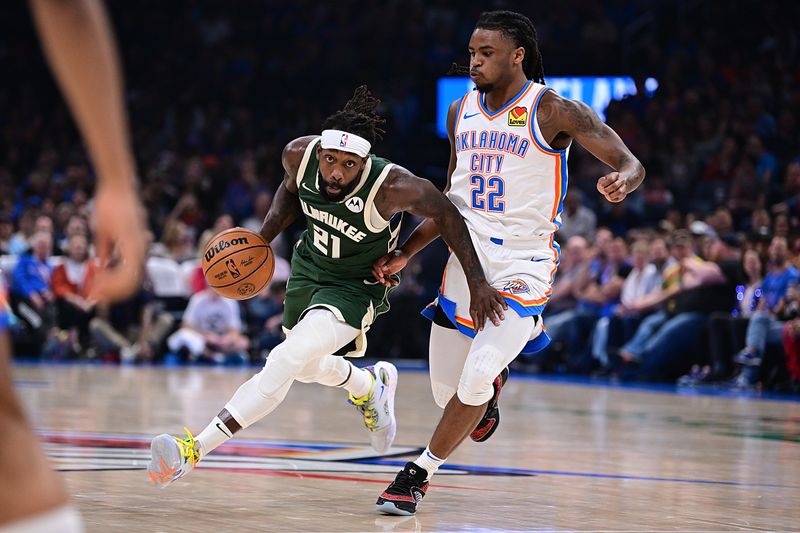 OKLAHOMA CITY, OKLAHOMA - APRIL 12: Patrick Beverley #21 of the Milwaukee Bucks attempts to drive past Cason Wallace #22 of the Oklahoma City Thunder during the first half at Paycom Center on April 12, 2024 in Oklahoma City, Oklahoma. NOTE TO USER: User expressly acknowledges and agrees that, by downloading and or using this Photograph, user is consenting to the terms and conditions of the Getty Images License Agreement. (Photo by Joshua Gateley/Getty Images)