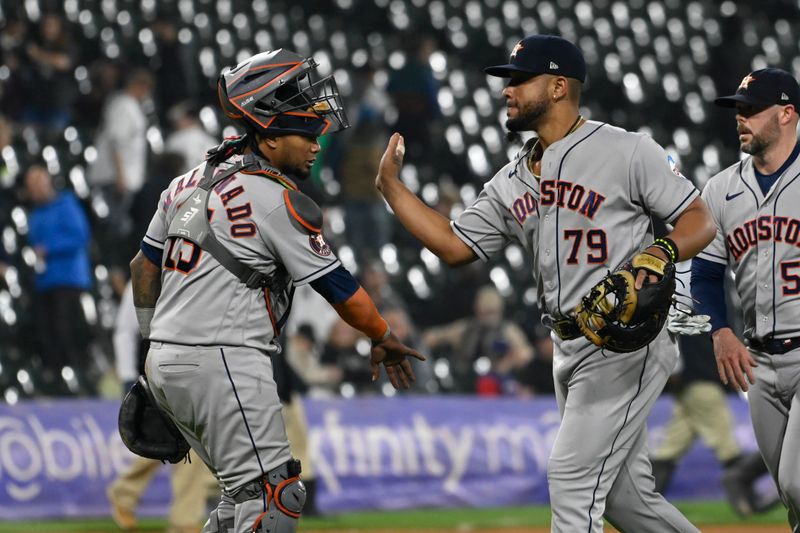 May 12, 2023; Chicago, Illinois, USA;  Houston Astros catcher Martin Maldonado (15) and Houston Astros first baseman Jose Abreu (79)  after the game against the Chicago White Sox at Guaranteed Rate Field. Mandatory Credit: Matt Marton-USA TODAY Sports