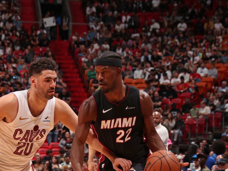 MIAMI, FL - MARCH 24: Jimmy Butler #22 of the Miami Heat handles the ball during the game against the Cleveland Cavaliers on March 24, 2024 at Kaseya Center in Miami, Florida. NOTE TO USER: User expressly acknowledges and agrees that, by downloading and or using this Photograph, user is consenting to the terms and conditions of the Getty Images License Agreement. Mandatory Copyright Notice: Copyright 2024 NBAE (Photo by Issac Baldizon/NBAE via Getty Images)