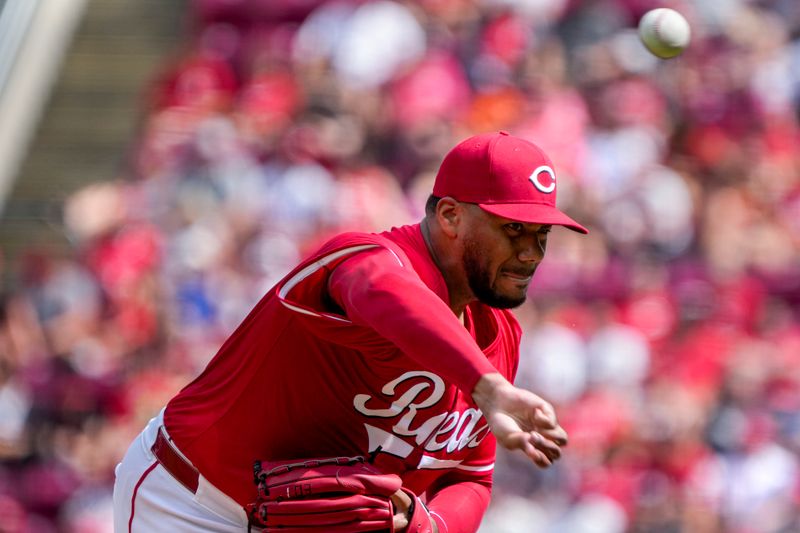 Jul 6, 2024; CINCINNATI, OHIO: Cincinnati Reds pitcher Hunter Greene (21) pitches to the Detroit Lions in the 2nd inning at Great American Ball Park Saturday July 6, 2024. Mandatory Credit: Cara Owsley-The Enquirer