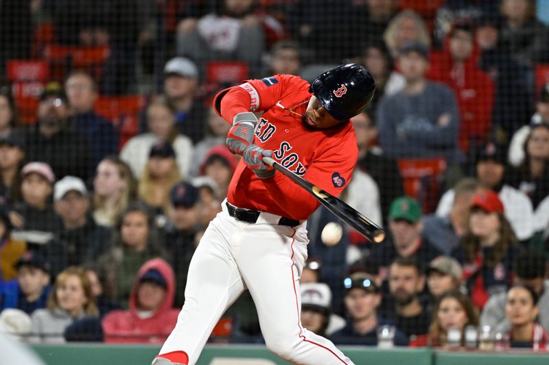 Sep 22, 2024; Boston, MA, USA;  Boston Red Sox second baseman Enmanuel Valdez (47) hits a single against the Minnesota Twins during the sixth inning at Fenway Park. Mandatory Credit: Eric Canha-Imagn Images