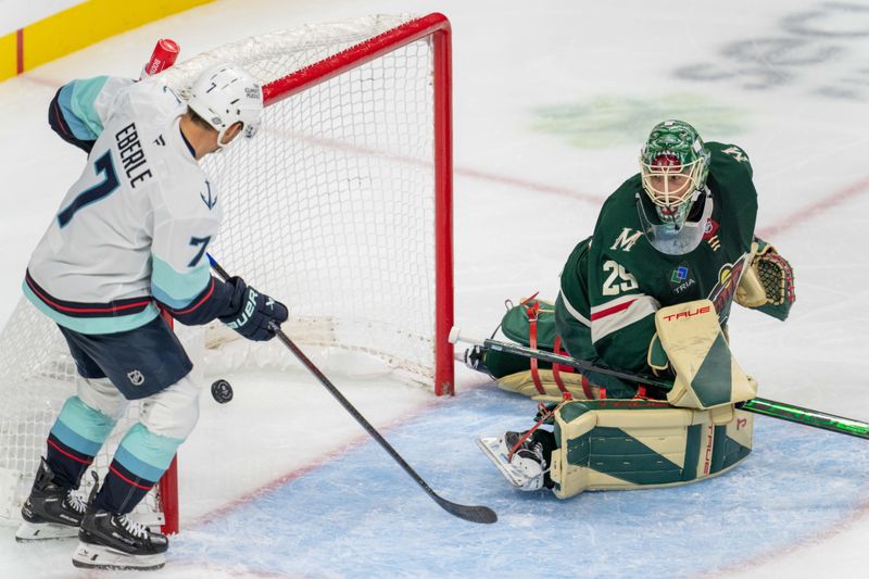 Oct 12, 2024; Saint Paul, Minnesota, USA; Seattle Kraken right wing Jordan Eberle (7) scores against Minnesota Wild goaltender Marc-Andre Fleury (29) in the second period at Xcel Energy Center. Mandatory Credit: Matt Blewett-Imagn Images