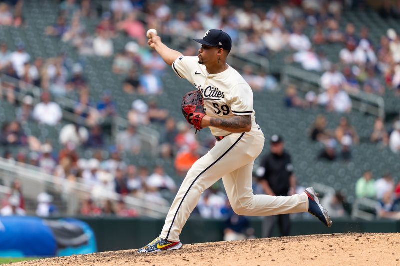 Jun 8, 2025; Minneapolis, Minnesota, USA; Minnesota Twins relief pitcher Jhoan Duran (59) delivers a pitch during the ninth inning against the Toronto Blue Jays at Target Field. Mandatory Credit: Jordan Johnson-Imagn Images
