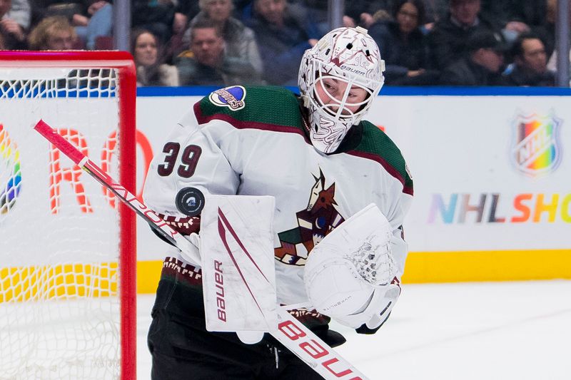 Jan 18, 2024; Vancouver, British Columbia, CAN; Arizona Coyotes goalie Connor Ingram (39) makes a save against the Vancouver Canucks in the third period at Rogers Arena. Vancouver won 2-1. Mandatory Credit: Bob Frid-USA TODAY Sports