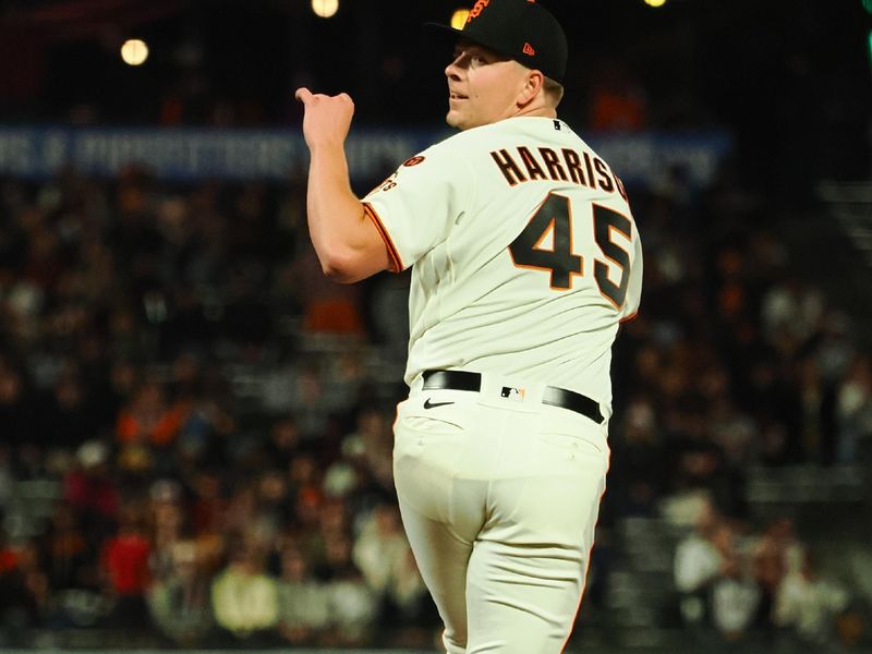 Aug 28, 2023; San Francisco, California, USA; San Francisco Giants starting pitcher Kyle Harrison (45) looks over his shoulder after a pitch against the Cincinnati Reds during the fifth inning at Oracle Park. Mandatory Credit: Kelley L Cox-USA TODAY Sports