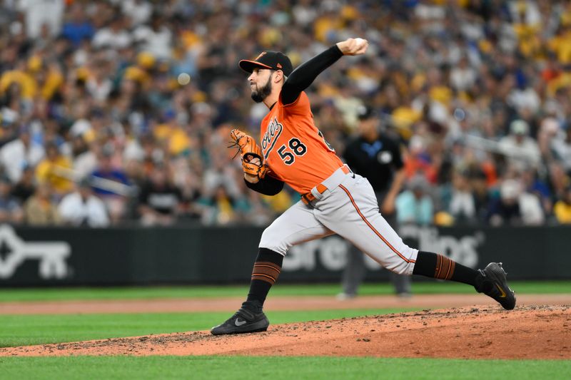 Aug 12, 2023; Seattle, Washington, USA; Baltimore Orioles relief pitcher Cionel Perez (58) pitches to the Seattle Mariners during the sixth inning at T-Mobile Park. Mandatory Credit: Steven Bisig-USA TODAY Sports