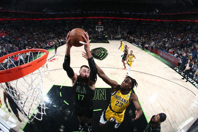 NEW ORLEANS, LA - MARCH 1:  Jonas Valanciunas #17 of the New Orleans Pelicans grabs a rebound during the game against the Indiana Pacers on March 1, 2024 at the Smoothie King Center in New Orleans, Louisiana. NOTE TO USER: User expressly acknowledges and agrees that, by downloading and or using this Photograph, user is consenting to the terms and conditions of the Getty Images License Agreement. Mandatory Copyright Notice: Copyright 2024 NBAE (Photo by Layne Murdoch Jr./NBAE via Getty Images)