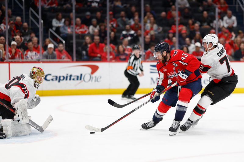 Feb 26, 2024; Washington, District of Columbia, USA; Washington Capitals right wing Tom Wilson (43) skates in on Ottawa Senators goaltender Joonas Korpisalo (70) as Senators defenseman Thomas Chabot (72) defends in the third period at Capital One Arena. Mandatory Credit: Geoff Burke-USA TODAY Sports