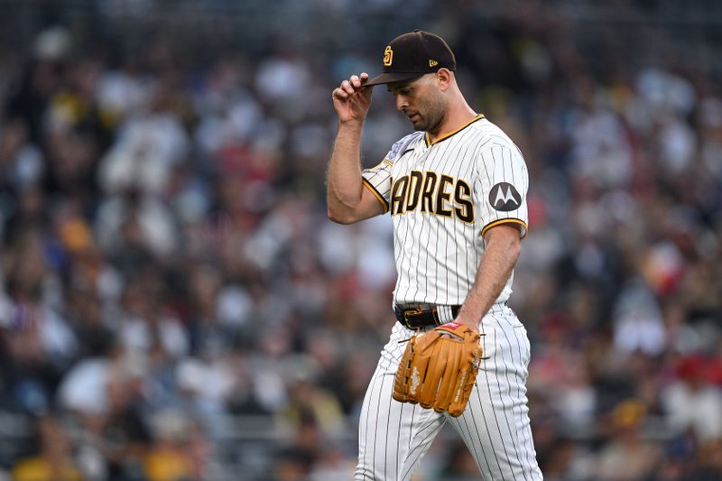 Jul 5, 2023; San Diego, California, USA; San Diego Padres relief pitcher Nick Martinez (21) walks to the dugout during the middle of the seventh inning against the Los Angeles Angels at Petco Park. Mandatory Credit: Orlando Ramirez-USA TODAY Sports