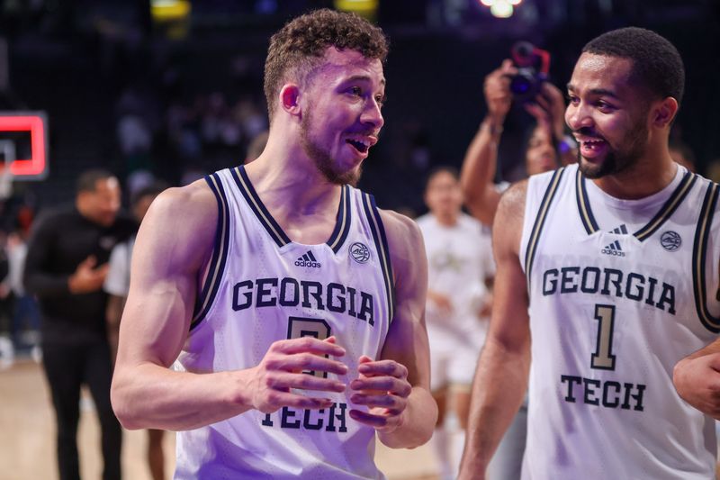 Feb 8, 2023; Atlanta, Georgia, USA; Georgia Tech Yellow Jackets guard Lance Terry (0) celebrates with guard Kyle Sturdivant (1) after a game-winning basket against the Notre Dame Fighting Irish at McCamish Pavilion. Mandatory Credit: Brett Davis-USA TODAY Sports