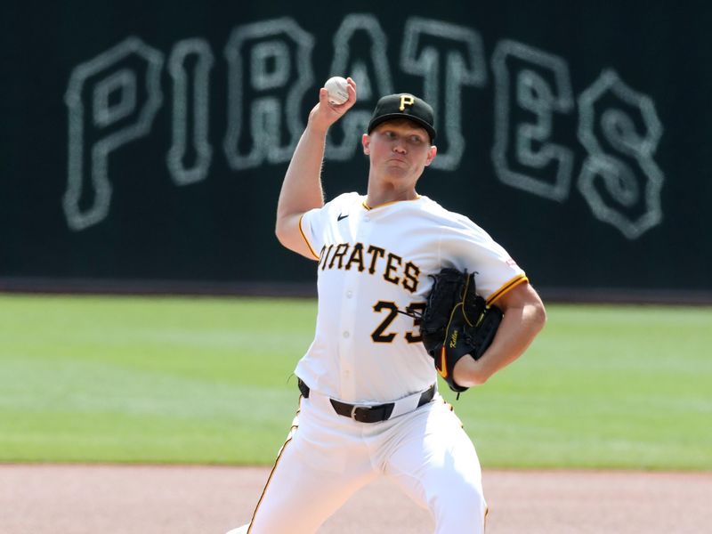 Apr 9, 2025; Pittsburgh, Pennsylvania, USA;  Pittsburgh Pirates starting pitcher Mitch Keller (23) delivers a pitch against the St. Louis Cardinals during the first inning at PNC Park. Mandatory Credit: Charles LeClaire-Imagn Images