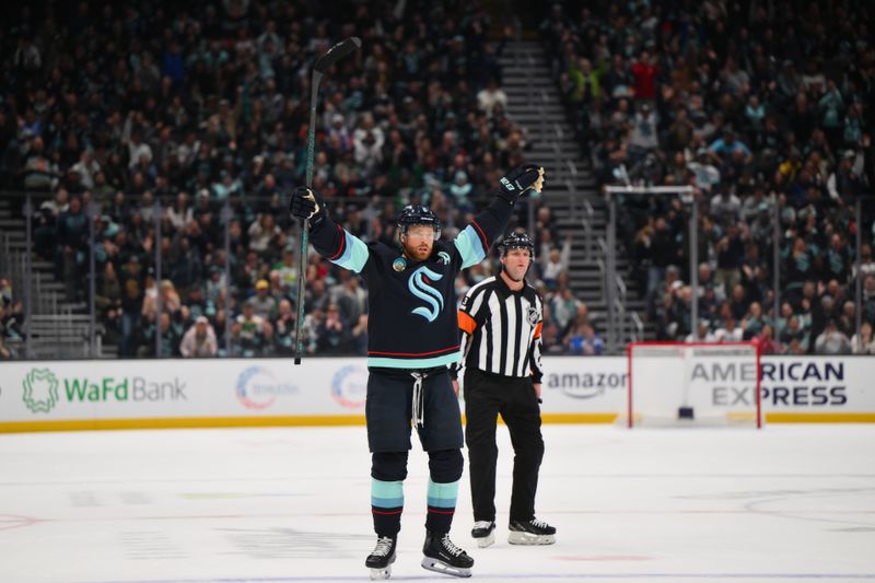 Mar 4, 2025; Seattle, Washington, USA; Seattle Kraken defenseman Adam Larsson (6) celebrates after scoring a goal against the Minnesota Wild during the first period at Climate Pledge Arena. Mandatory Credit: Steven Bisig-Imagn Images