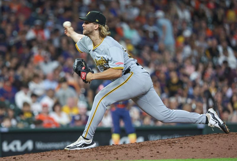 Jul 29, 2024; Houston, Texas, USA; Pittsburgh Pirates relief pitcher Carmen Mlodzinski (50) delivers a pitch during the seventh inning against the Houston Astros at Minute Maid Park. Mandatory Credit: Troy Taormina-USA TODAY Sports