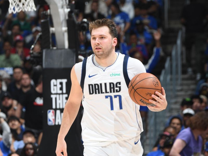 LOS ANGELES, CA - APRIL 21: Luka Doncic #77 of the Dallas Mavericks dribbles the ball during the game against the LA Clippers during the 2024 NBA Playoffs on April 21, 2024 at Crypto.Com Arena in Los Angeles, California. NOTE TO USER: User expressly acknowledges and agrees that, by downloading and/or using this Photograph, user is consenting to the terms and conditions of the Getty Images License Agreement. Mandatory Copyright Notice: Copyright 2024 NBAE (Photo by Andrew D. Bernstein/NBAE via Getty Images)