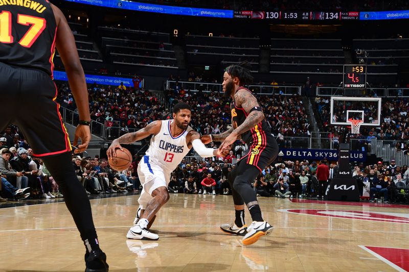 ATLANTA, GA - FEBRUARY 5: Paul George #13 of the LA Clippers dribbles the ball during the game against the Atlanta Hawks on February 5, 2024 at State Farm Arena in Atlanta, Georgia.  NOTE TO USER: User expressly acknowledges and agrees that, by downloading and/or using this Photograph, user is consenting to the terms and conditions of the Getty Images License Agreement. Mandatory Copyright Notice: Copyright 2024 NBAE (Photo by Scott Cunningham/NBAE via Getty Images)