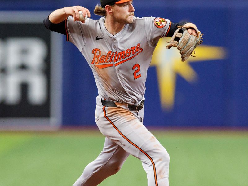 Jun 9, 2024; St. Petersburg, Florida, USA;  Baltimore Orioles shortstop Gunnar Henderson (2) fields the ball for an out against the Tampa Bay Rays in the seventh inning at Tropicana Field. Mandatory Credit: Nathan Ray Seebeck-USA TODAY Sports