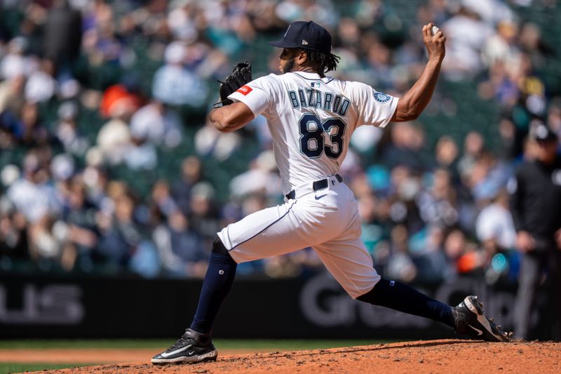 Apr 9, 2025; Seattle, Washington, USA;  Seattle Mariners reliever Eduard Bazardo (83) delivers a pitch during the fifth inning against the Houston Astros at T-Mobile Park. Mandatory Credit: Stephen Brashear-Imagn Images
