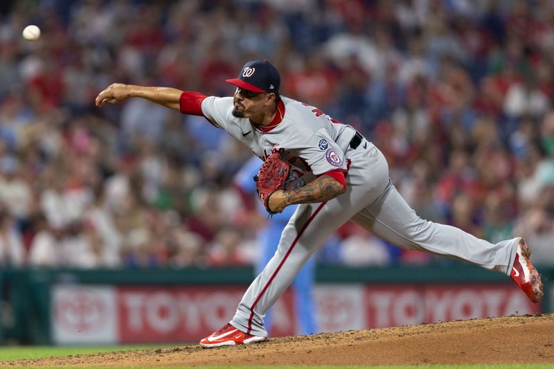 Aug 10, 2023; Philadelphia, Pennsylvania, USA; 
Washington Nationals relief pitcher Andres Machado (57) throws a pitch during the sixth inning against the Philadelphia Phillies at Citizens Bank Park. Mandatory Credit: Bill Streicher-USA TODAY Sports