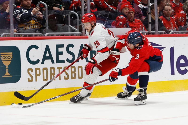 Jan 5, 2024; Washington, District of Columbia, USA; Carolina Hurricanes center Sebastian Aho (20) skates with the puck as Washington Capitals defenseman Nick Jensen (3) chases in the second period at Capital One Arena. Mandatory Credit: Geoff Burke-USA TODAY Sports