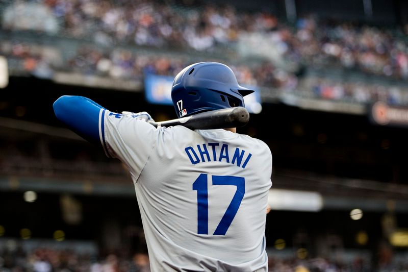 May 15, 2024; San Francisco, California, USA; Los Angeles Dodgers designated hitter Shohei Ohtani (17) on deck against the San Francisco Giants during the first inning at Oracle Park. Mandatory Credit: John Hefti-USA TODAY Sports