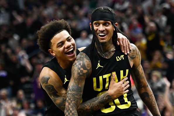 SALT LAKE CITY, UTAH - JANUARY 01: Keyonte George #3 celebrates a triple-double by Jordan Clarkson #00 of the Utah Jazz during the second half of a game against the Dallas Mavericks at Delta Center on January 01, 2024 in Salt Lake City, Utah. NOTE TO USER: User expressly acknowledges and agrees that, by downloading and or using this photograph, User is consenting to the terms and conditions of the Getty Images License Agreement. (Photo by Alex Goodlett/Getty Images)