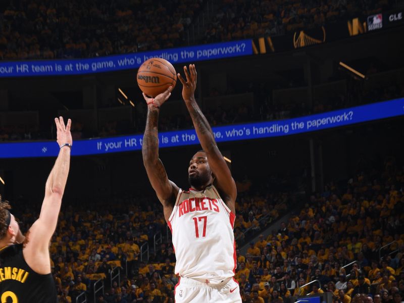 SAN FRANCISCO, CA - MAY 2:  Tari Eason #17 of the Houston Rockets shoots a three point basket during the game against the Golden State Warriors during Round 1 Game 6 of the 2025 NBA Playoffs on May 2, 2025 at Chase Center in San Francisco, California. NOTE TO USER: User expressly acknowledges and agrees that, by downloading and or using this photograph, user is consenting to the terms and conditions of Getty Images License Agreement. Mandatory Copyright Notice: Copyright 2025 NBAE (Photo by Noah Graham/NBAE via Getty Images)