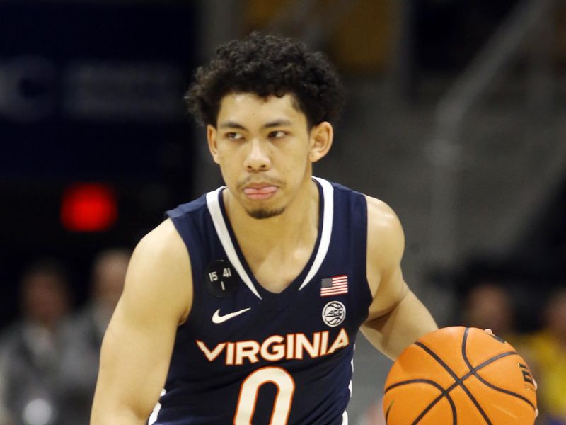 Jan 3, 2023; Pittsburgh, Pennsylvania, USA; Virginia Cavaliers guard Kihei Clark (0) brings the ball up court against the Pittsburgh Panthers during the second half at the Petersen Events Center. Pittsburgh won 68-65. Mandatory Credit: Charles LeClaire-USA TODAY Sports