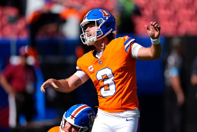 Denver Broncos place kicker Wil Lutz practices during pregame of an NFL football game against the Las Vegas Raiders, Sunday, Oct. 6, 2024, in Denver. (AP Photo/David Zalubowski)