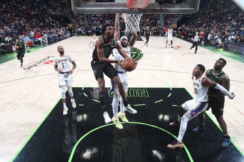 NEW ORLEANS, LA - APRIL 14: Herb Jones #5 of the New Orleans Pelicans drives to the basket during the game against the Los Angeles Lakers on April 14, 2024 at the Smoothie King Center in New Orleans, Louisiana. NOTE TO USER: User expressly acknowledges and agrees that, by downloading and or using this Photograph, user is consenting to the terms and conditions of the Getty Images License Agreement. Mandatory Copyright Notice: Copyright 2024 NBAE (Photo by Layne Murdoch Jr./NBAE via Getty Images)