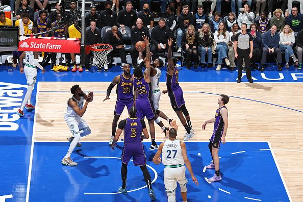 MINNEAPOLIS, MN -  DECEMBER 30: Anthony Edwards #5 of the Minnesota Timberwolves drives to the basket during the game against the Los Angeles Lakers on December 30, 2023 at Target Center in Minneapolis, Minnesota. NOTE TO USER: User expressly acknowledges and agrees that, by downloading and or using this Photograph, user is consenting to the terms and conditions of the Getty Images License Agreement. Mandatory Copyright Notice: Copyright 2023 NBAE (Photo by David Sherman/NBAE via Getty Images)