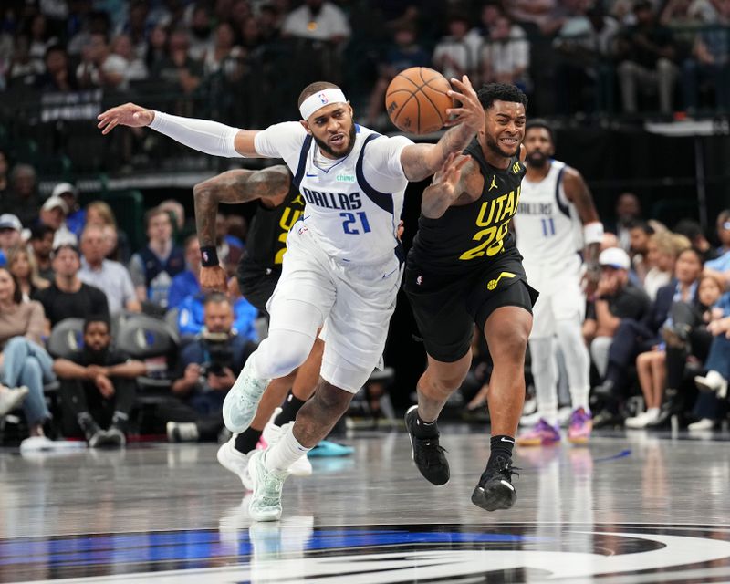 DALLAS, TX - OCTOBER 10: Daniel Gafford #21 of the Dallas Mavericks and Brice Sensabaugh #28 of the Utah Jazz fight for a loose ball during the game on October 10, 2024 at American Airlines Center in Dallas, Texas. NOTE TO USER: User expressly acknowledges and agrees that, by downloading and or using this photograph, User is consenting to the terms and conditions of the Getty Images License Agreement. Mandatory Copyright Notice: Copyright 2024 NBAE (Photo by Glenn James/NBAE via Getty Images)